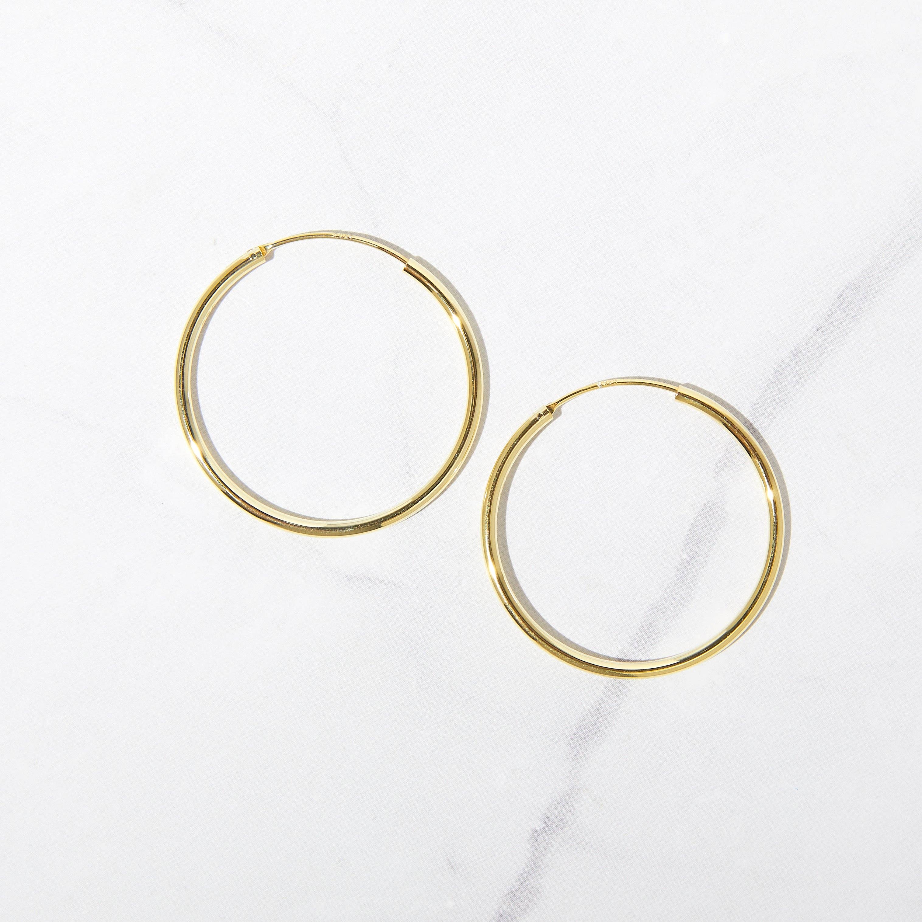 Sami Jewels – wholesale Hoop earrings – 32mm Infinity Hoops
