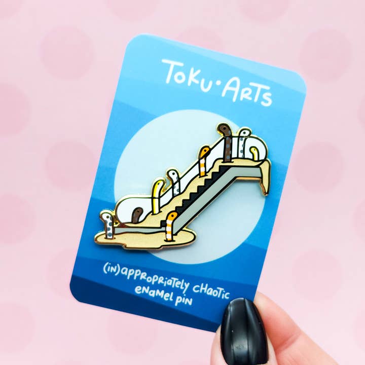 Eelscalator Enamel Pin for wholesale by Toku Arts