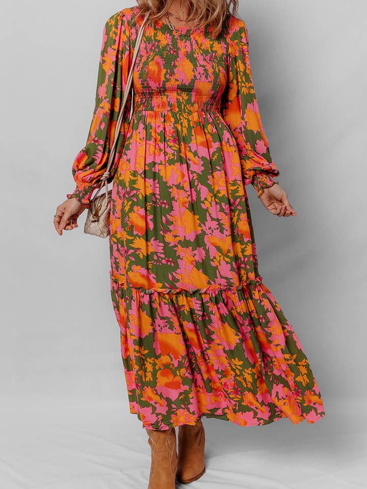 Orange Orange blommig klänning med puffärmar, smockad liv och volanger. för wholesale på Faire5