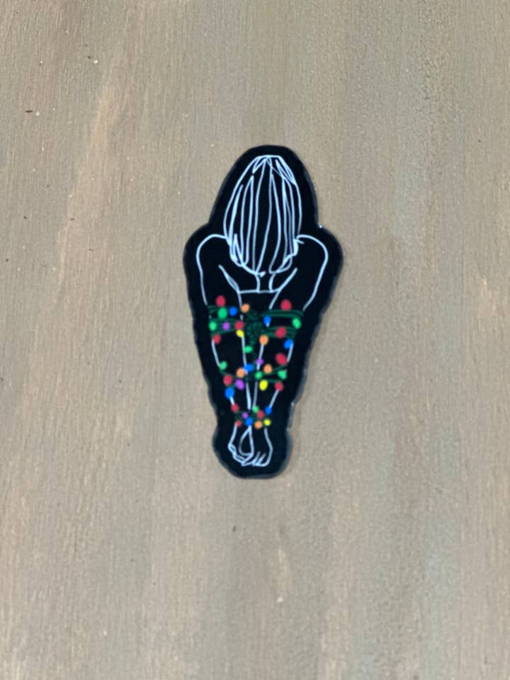 Tied up with Lights Sticker for wholesale by Messterpieces