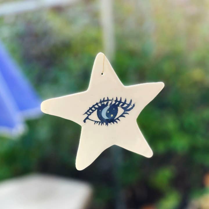 Stervormig porseleinen ornament met kwaadaardige oogbescherming voor wholesale door Chrys' Porcelain