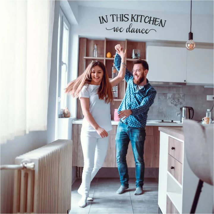 In This Kitchen We Dance | Kitchen Wall Decor Vinyl Decal Sign for wholesale by The Simple Stencil