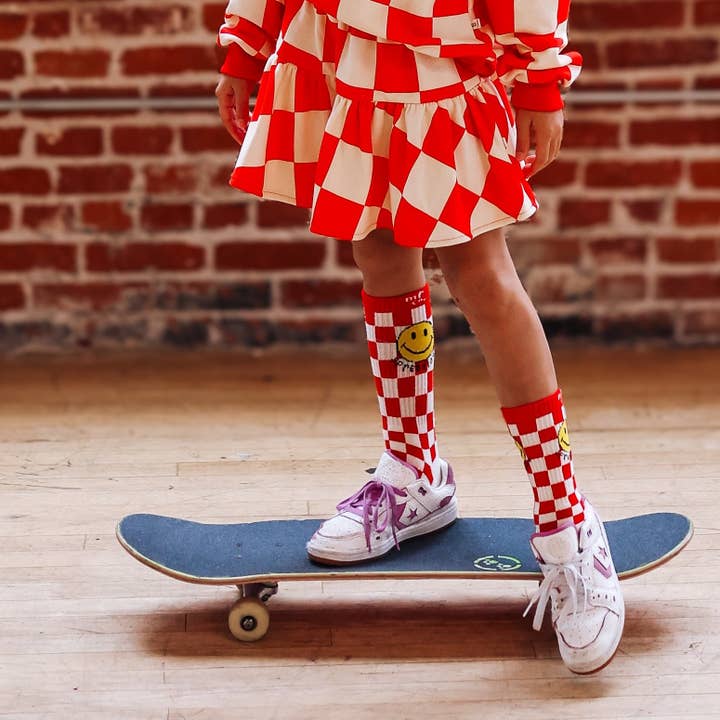 MINI SKIRT | IN CHECKERED RED | GIRLS for wholesale by Minimalist Folk Co.