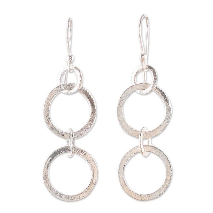 Novica Handmade Dancing Cycles Sterling Dangle Earrings for wholesale by NOVICA