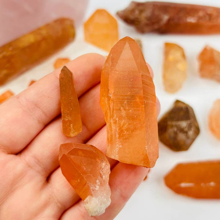 Lemurian Tangerine Quartz Crystal Point - By Weight for wholesale by Rock Paradise