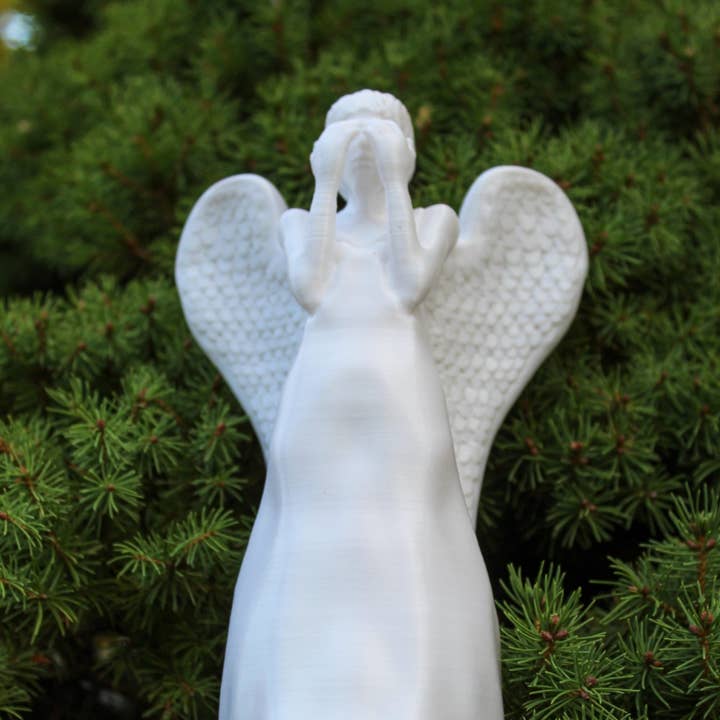 Weeping Angel Christmas Tree Topper from Doctor Who for Whovians | 7" tall for wholesale by Clever Contraptions