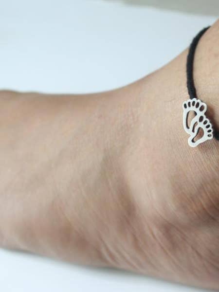 Cavigliera con ciondoli. per la vendita all'ingrosso da parte di Mirasalondon