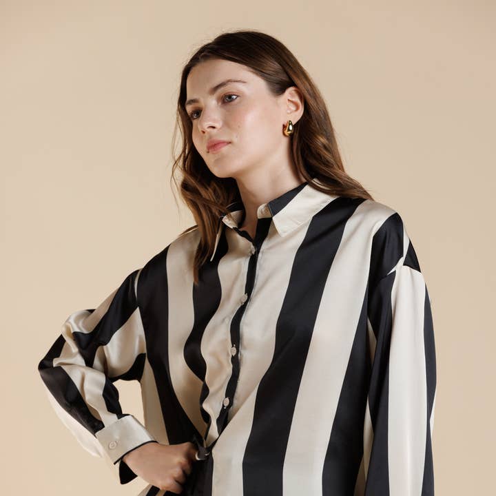 Bold Stripe Button Down Satin Long Sleeve Shirt and other Purchase Wholesale vertical. Free Returns & Net 60 Terms on Faire trending on Faire.