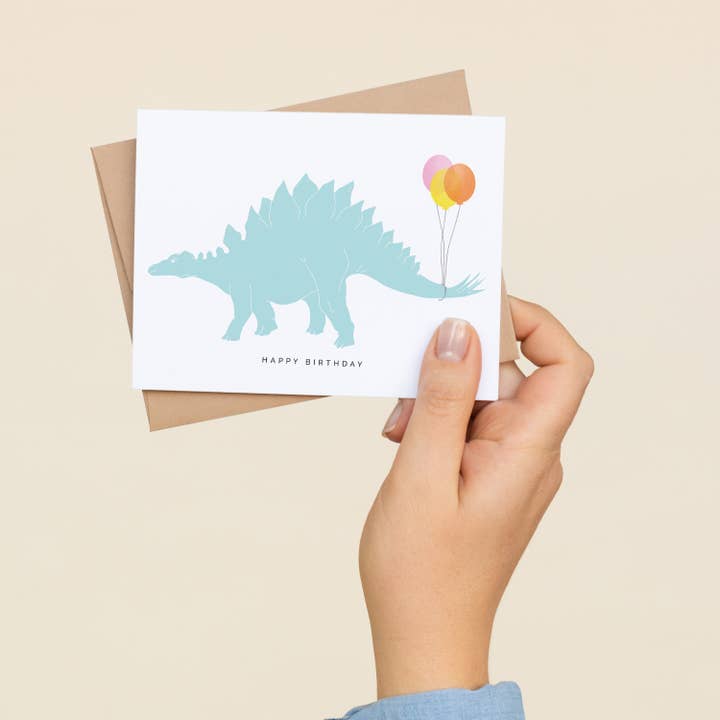 Dinosaur med balloner fødselsdagskort | Hilsenkort for engroshandel hos HAZELMADE® Tea Towels + Gifts
