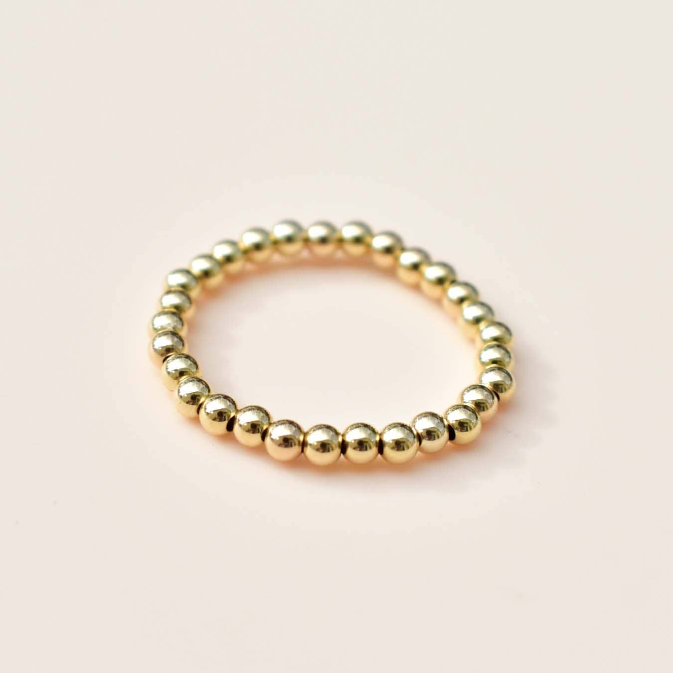 The Paper Dress – wholesale Band/stacked ring – GOLD BEAD STRETCHY RING1