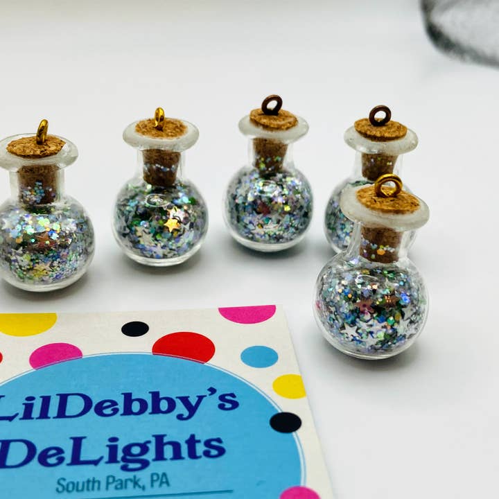 Bottle of glitter, silver stars. for wholesale by LilDebby's DeLights