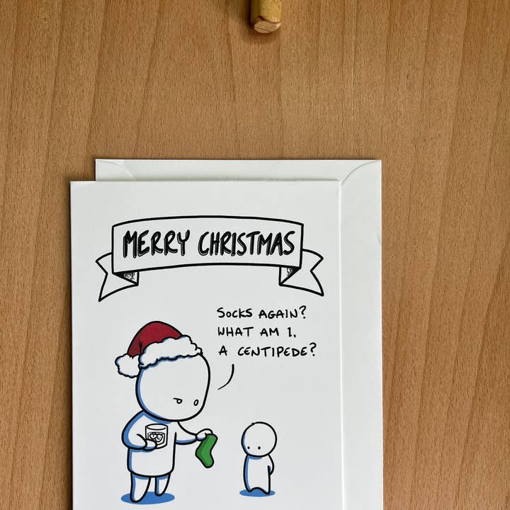 Encore des chaussettes ? - Carte de Noël pour la vente par Rob Stears Illustration