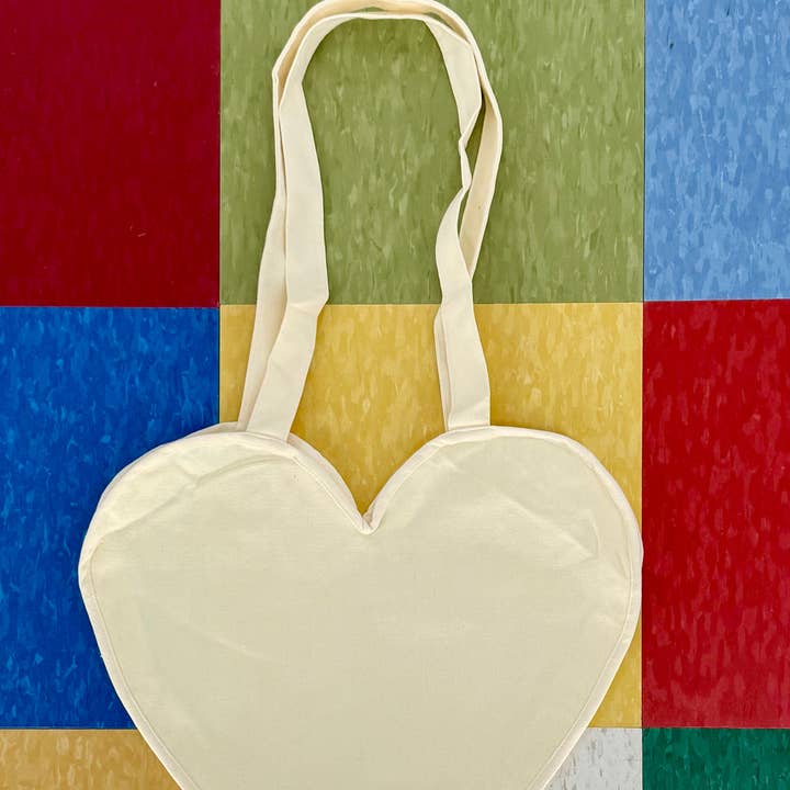 Sac Cœur Ivoire pour la vente par Astro Bettie