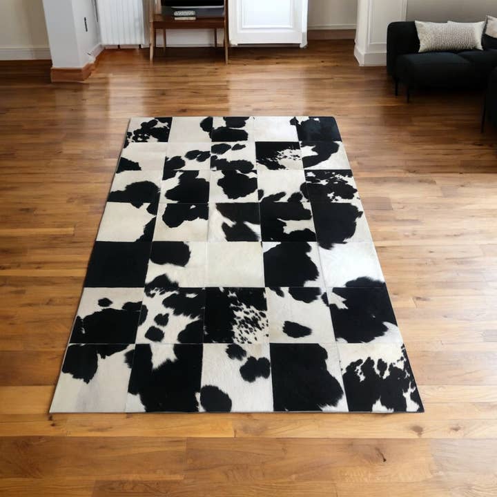 Karelias And Sons - Wholesale Area Rug - Black & White Cow Print Cowhide Patchwork Rug