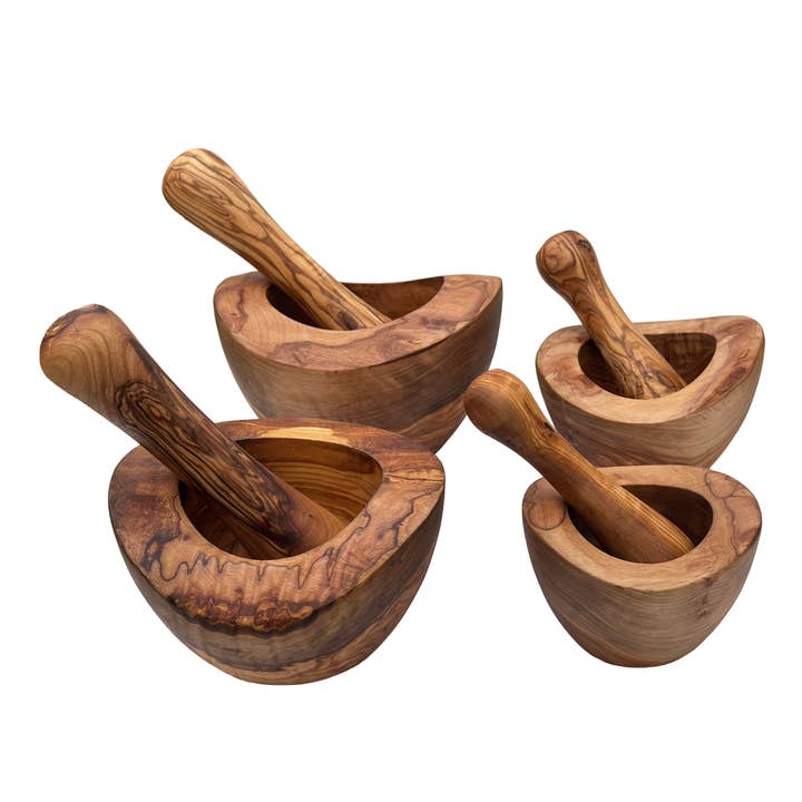 Mortar with pestle natural rim handmade from olive wood for wholesale by medina mood