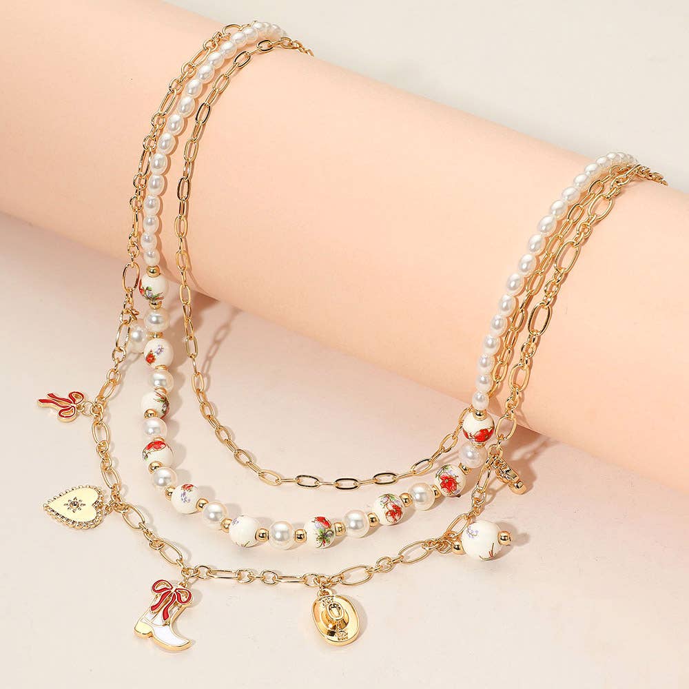Sensibling Corp. - Wholesale Pendant/Charm Necklace - Western Cowboy Boot Hat Bow Cherry Heart Charm Station Pearl Floral Ceramic Ball Beaded Layered Necklace6