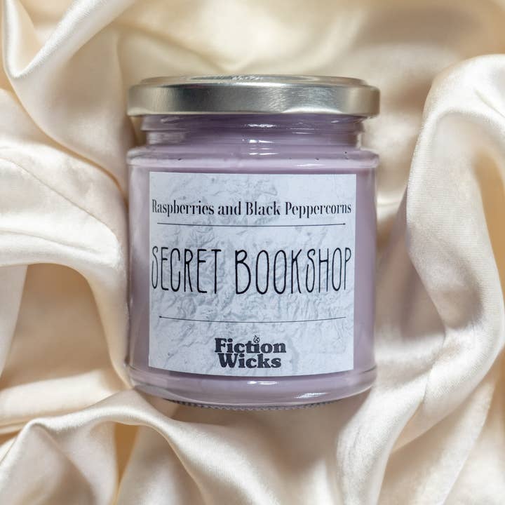 Secret Bookshop | Raspberry and Peppercorn fragrance candle for wholesale by Fictionwicks