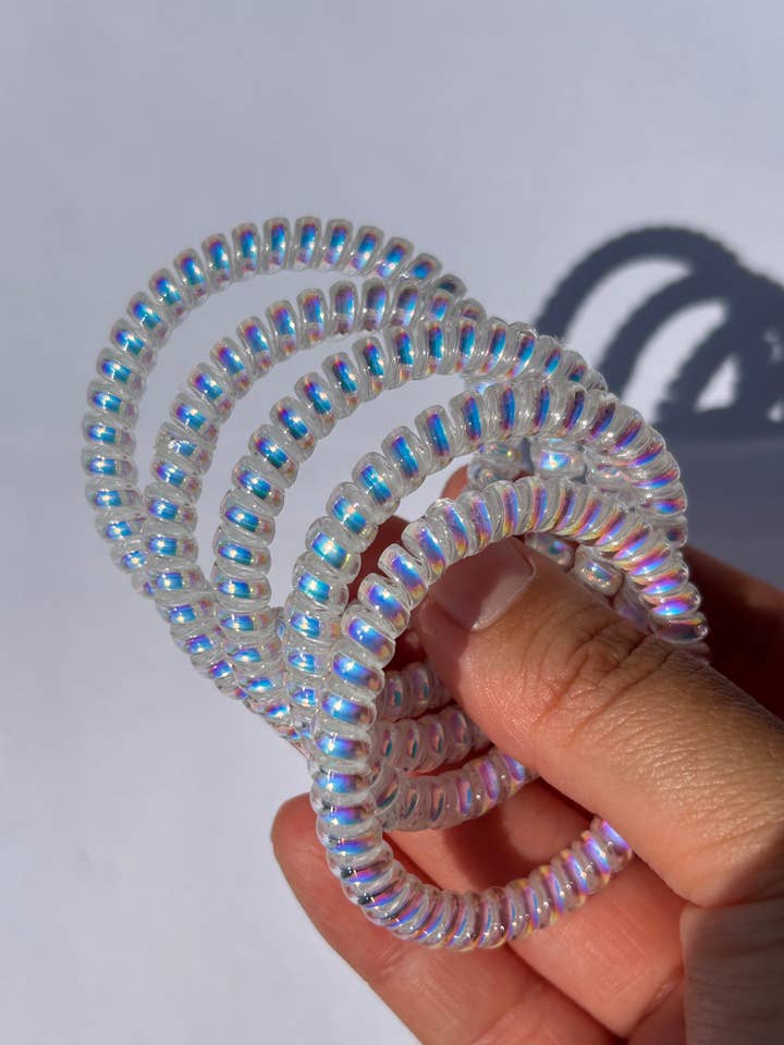 Holographic Hair Coils for wholesale by Lipglossbyclaudia