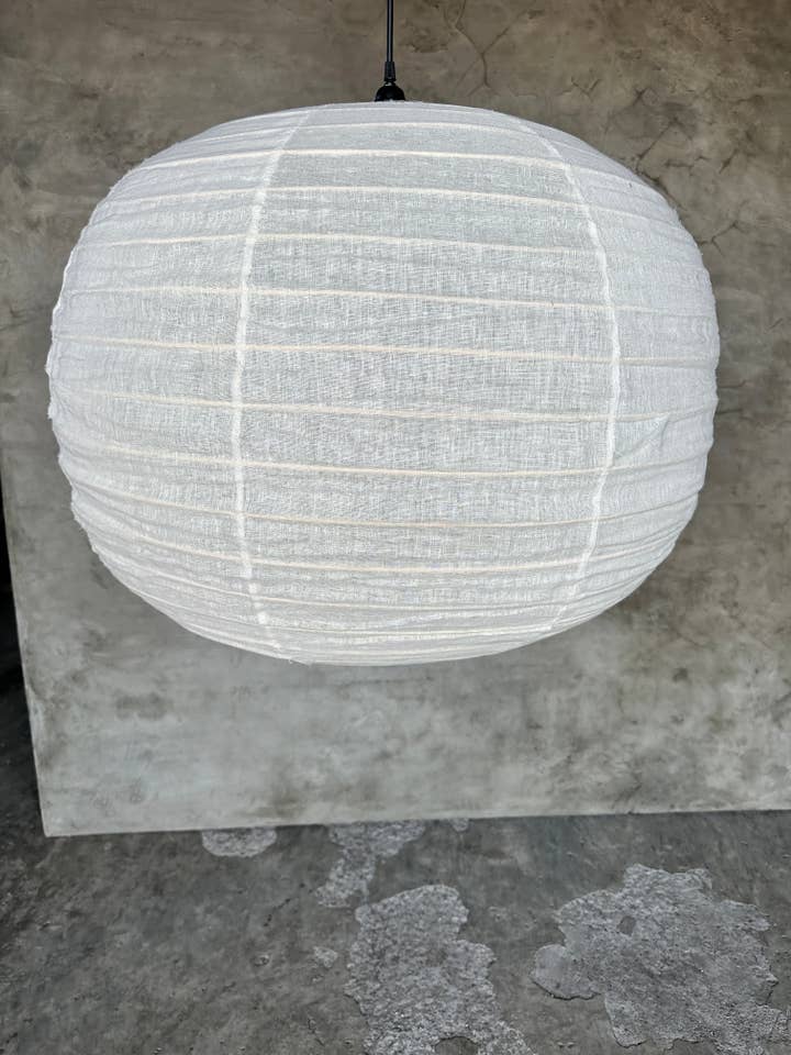 Large round flattened Japanese-style pendant light in rattan and natural linen (Labu) H57 D80 for wholesale by Office Objets
