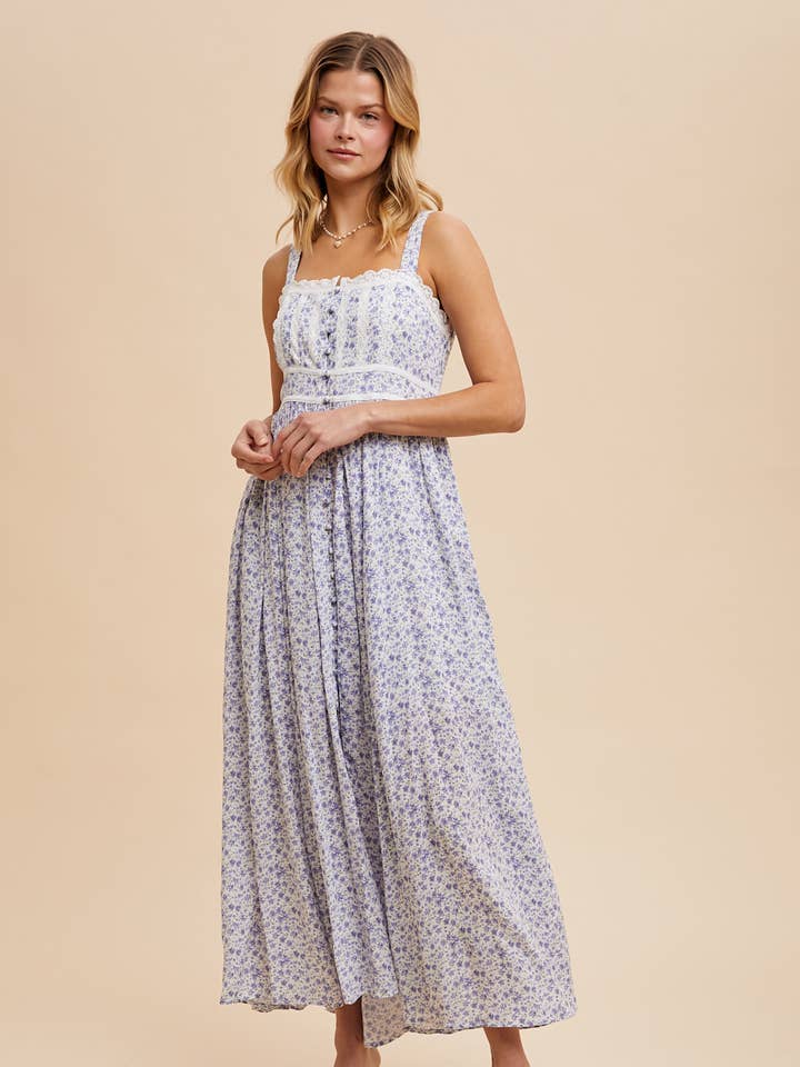 ROBE LONGUE SANS MANCHES À BOUTONS FLORAUX pour la vente par In Loom