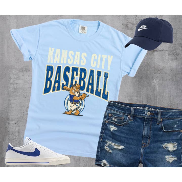 Kansas City Baseball Lion Baseball Player Light Blue Tee for wholesale by The Red Rival Wholesale