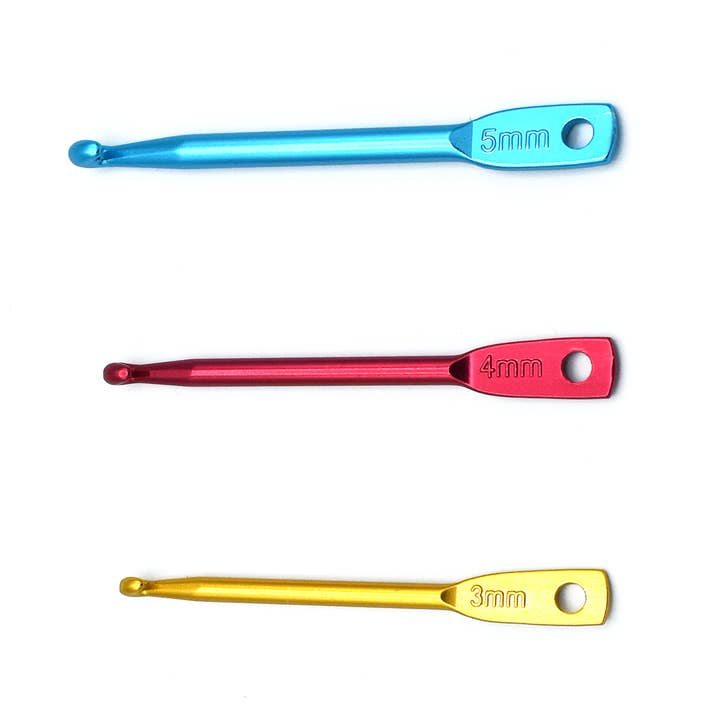 Pretty Warm Designs - Wholesale Knitting/Crochet Supplies - Knitting Stitch Fixers - set of 3 tiny crochet hooks on ring2