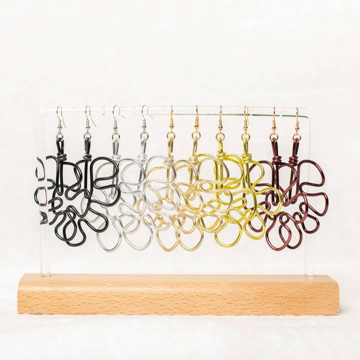 Monstera Earrings for wholesale by Slow As Folk