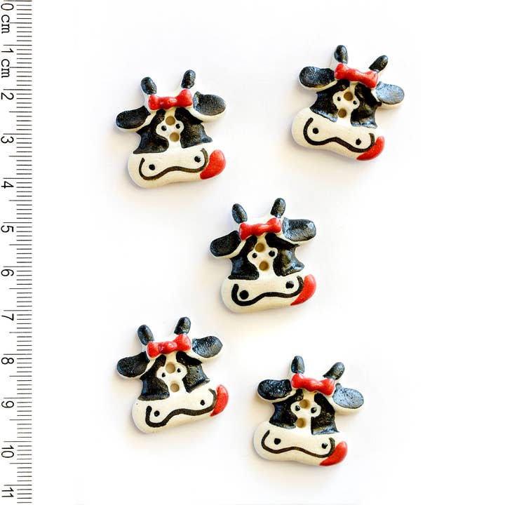 L144 Cow Buttons for wholesale by Incomparable Buttons