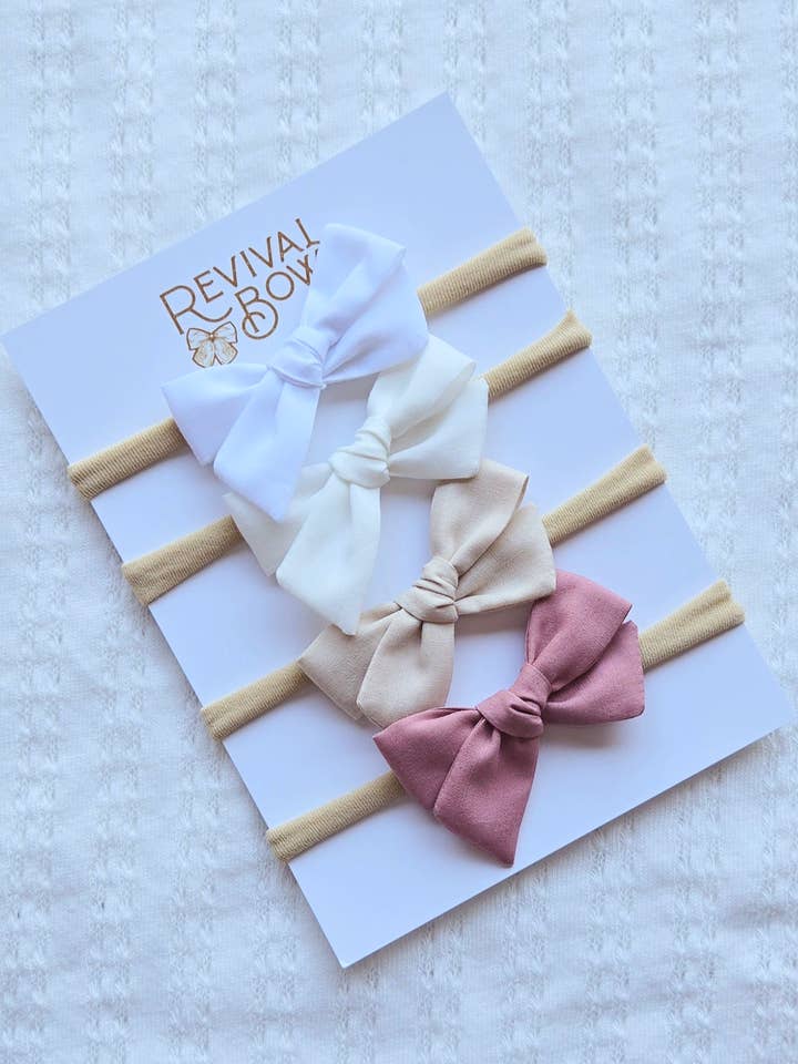 Mini Pinwheel Bow on Headband • Cloud White • Fabric Bow for wholesale by Revival Bow Co.