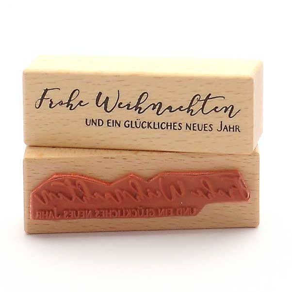 Stamp: Merry Christmas And A Happy New Year · German Text for wholesale by Heindesign