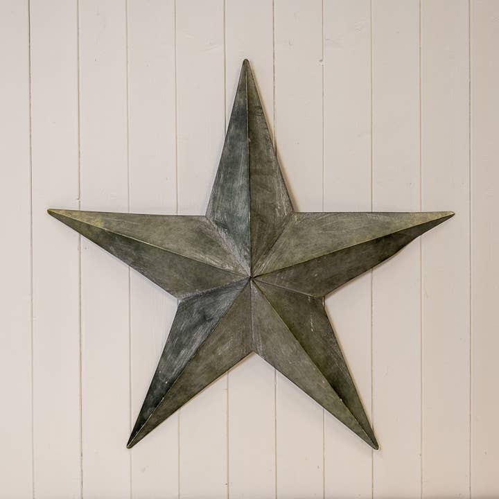 Natural Grey Metal Star Decorations for wholesale by Satchville