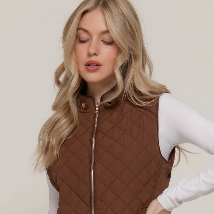 Suede Piping Detail Rib Quilted Padding Vest and other Purchase Wholesale kelley and company. Free Returns & Net 60 Terms on Faire trending on Faire.