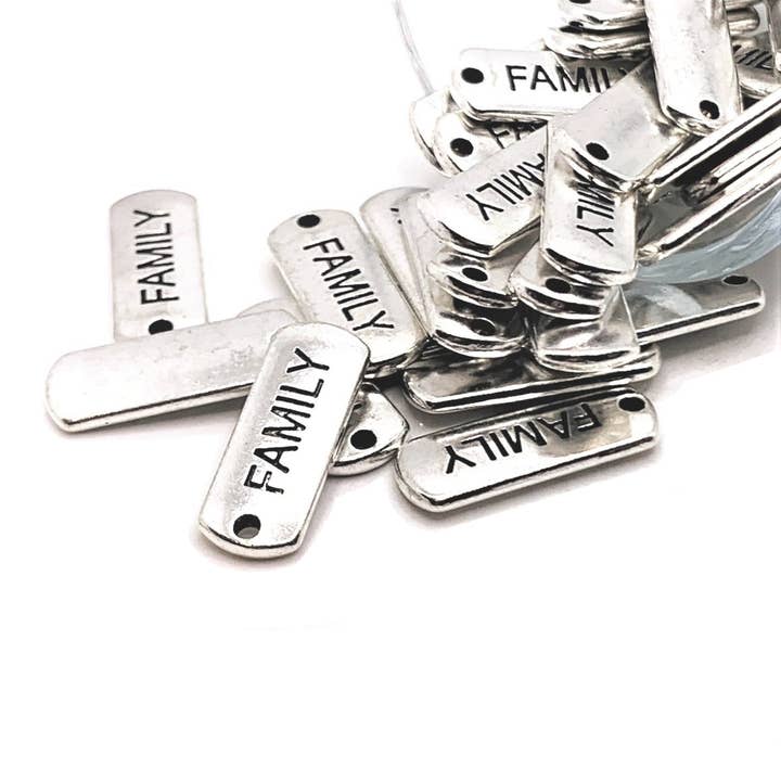 Silver Family Word Bar Tag Charms, 8x21mm for wholesale by Guerrilla Charm