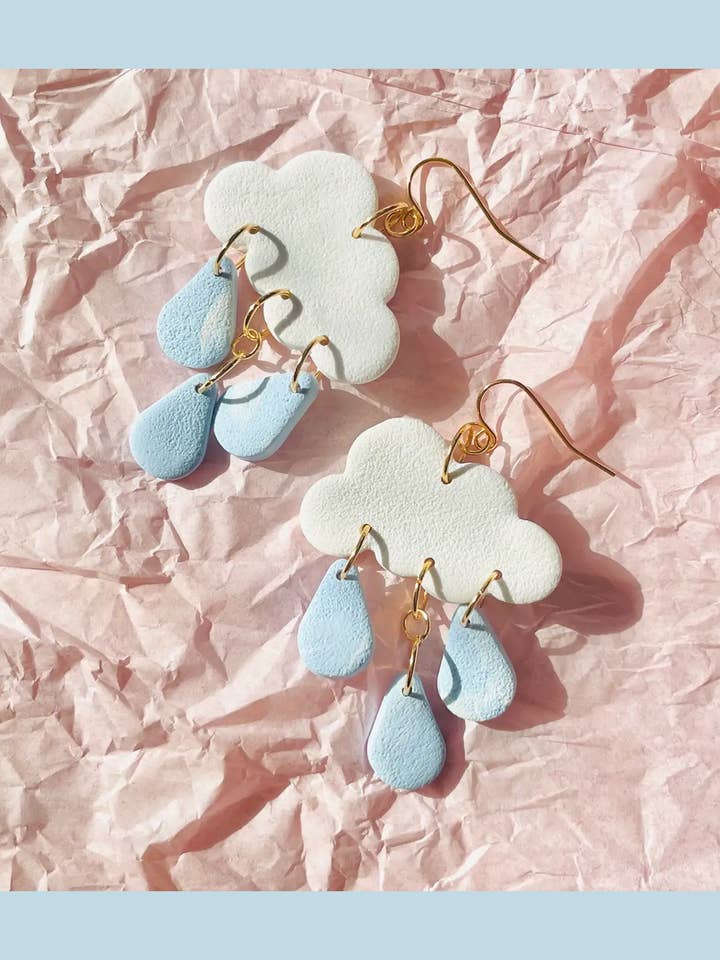 rainy day (baby blue) cloud polymer clay statement earrings for wholesale by Sunblind Fine Art + Wearables