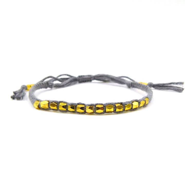 Friendship style bracelet with facetted metal bead detail for wholesale by Tempest Designs