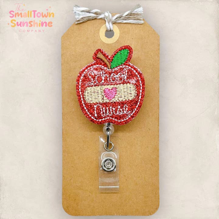 School Nurse Apple Badge Reel for wholesale by The SmallTownSunshine Company