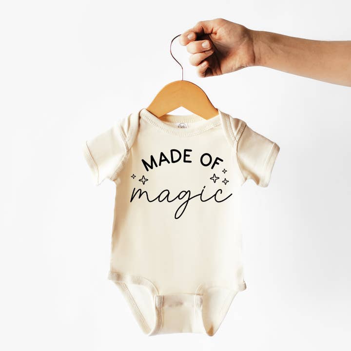 Made Of Magic | 100% Cotton Baby Bodysuit or Tee | St Patty for wholesale by Wildflowers + Cotton