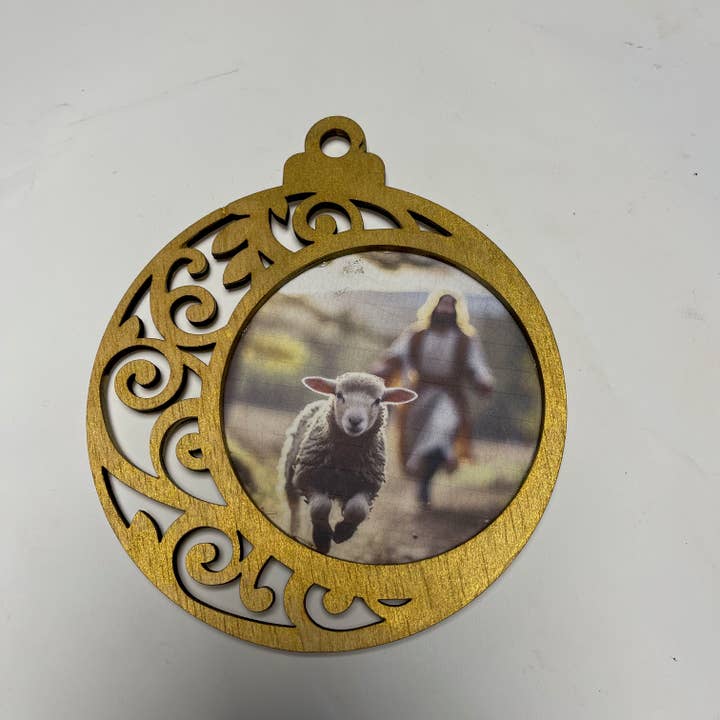 Scrolled Jesus and Lamb Ornament for wholesale by LAND OF COTTON