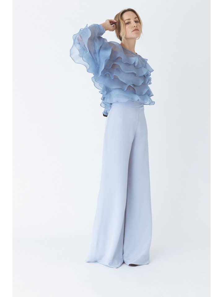 Blu Blusa blu voluminoso con volant in vendita all'ingrosso su Faire1