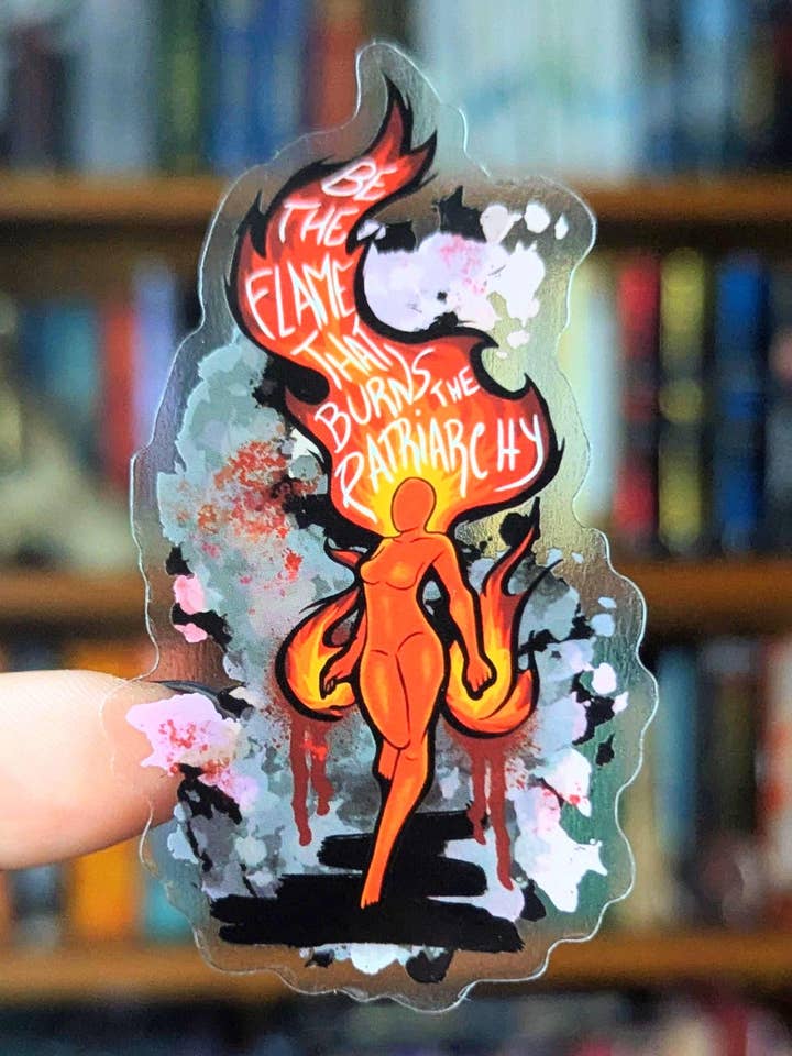 be the flame that burns the patriarchy feminine rage translucent sticker for wholesale by Geek and Artsy