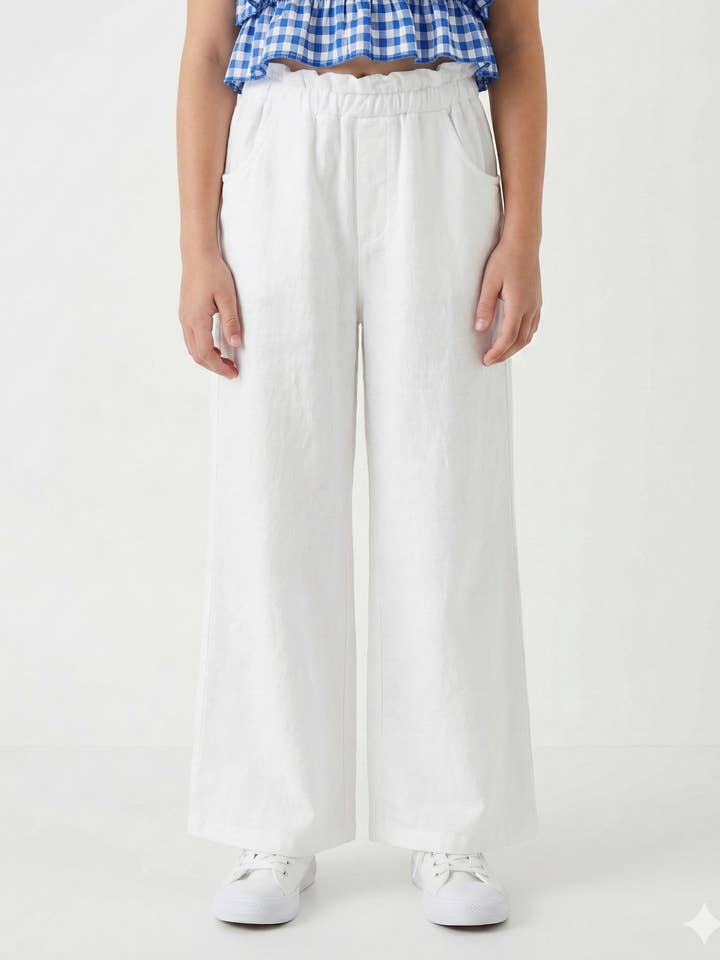 Pantalon en lin, ample et à taille élastiquée pour fille pour la vente par MINI MIGNON PARIS