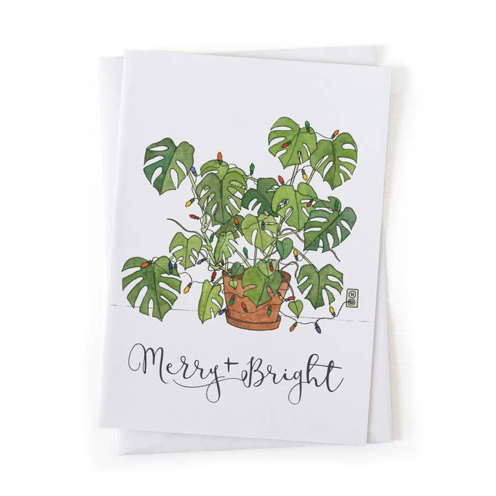 "Merry and Bright" Christmas Monstera Plant Holiday Card 5x7 for wholesale by Wander & Gather