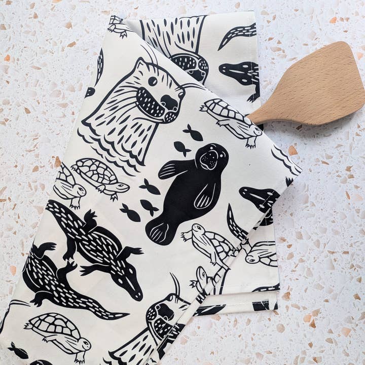 Dish Towel - River Critters (black & white) tea towel for wholesale by Natalie V. Mason