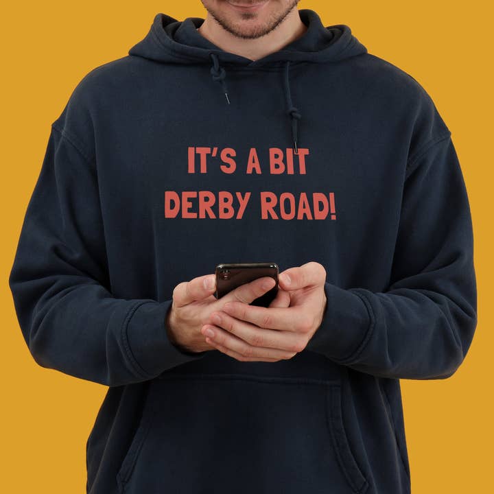 Sweat à capuche Derby Road « It's a bit Derby Road » pour la vente par Dukki Gifts