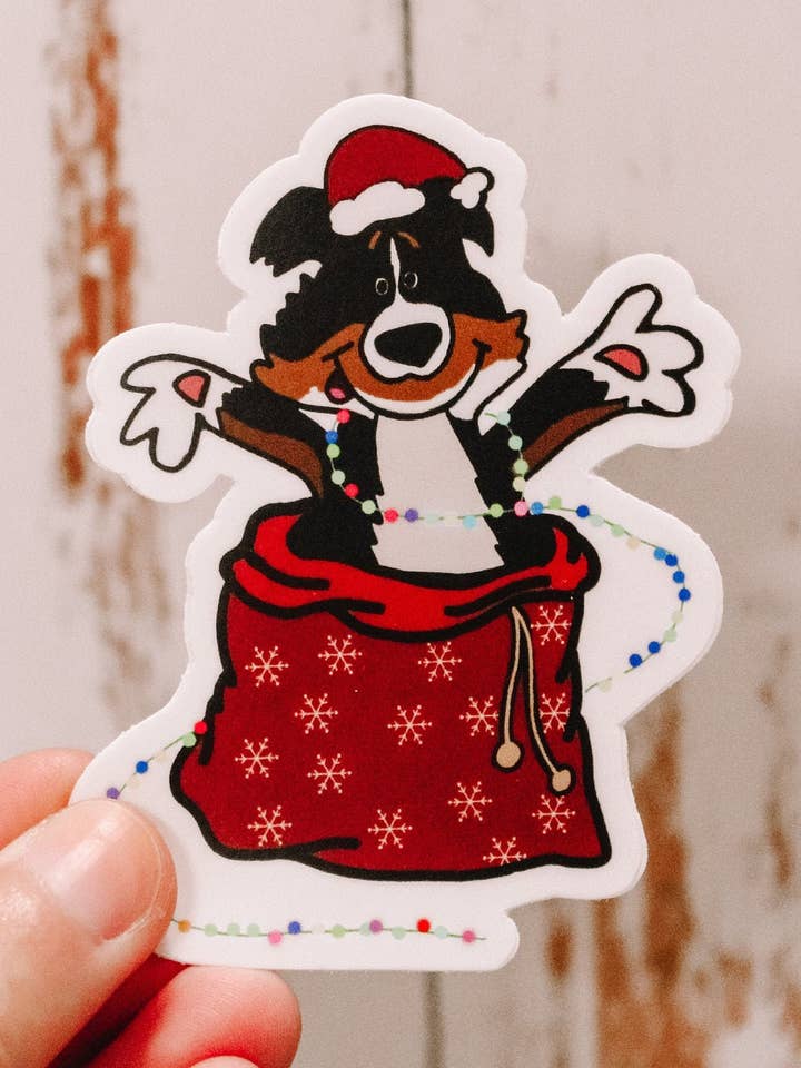 Kona in Santa's Bag Sticker | Aussie Sticker | Christmas for wholesale by Jaxey Designs