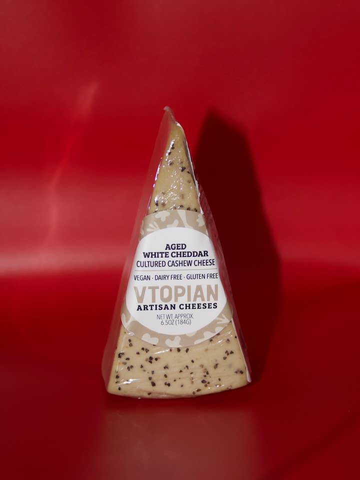 Aged White Cheddar Plant-Based Wedge for wholesale by Vtopian Artisan Cheeses