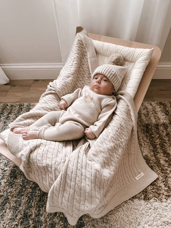 Luna + Luca Cable Knit Baby Blanket - Beige for wholesale by Luna + Luca