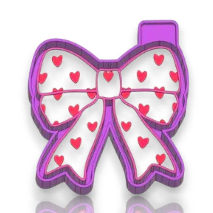 Roussell Prints and Demand LLC - Vendita all'ingrosso Attrezzature per lavoretti e fai da te - Stampo in silicone a forma di cuore con fiocco0