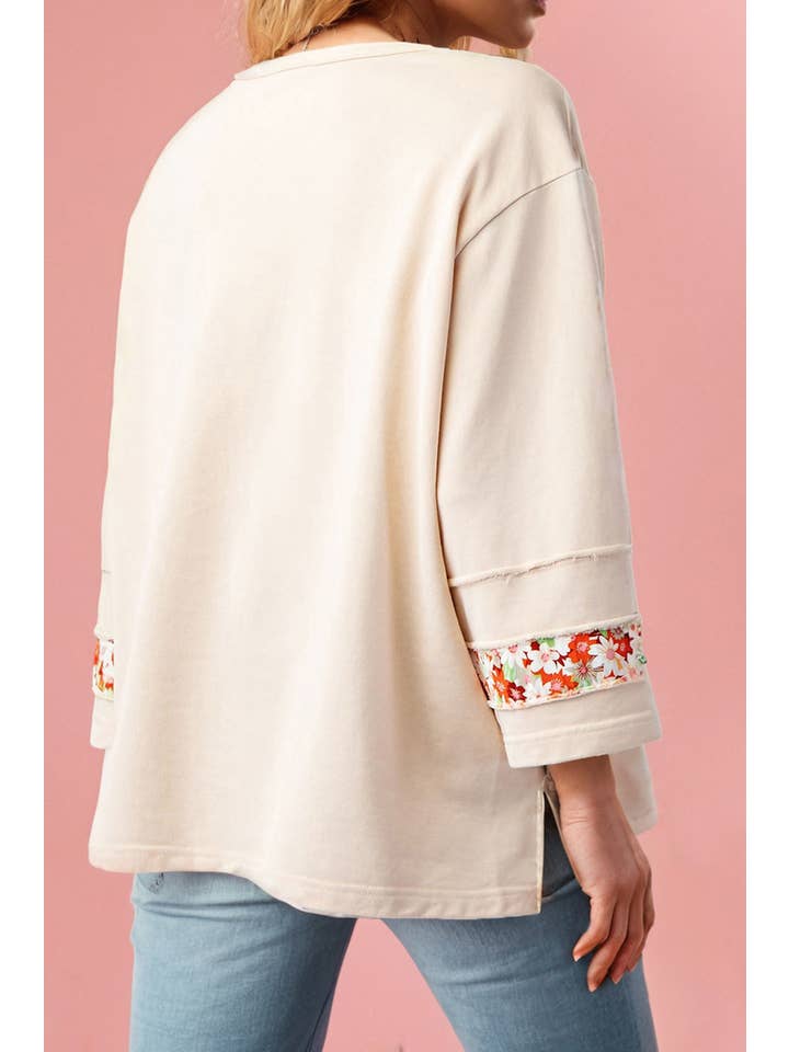 Beige Plus Size Flower Patched Side Slits Crewneck Top (S-4X) for wholesale on Faire3