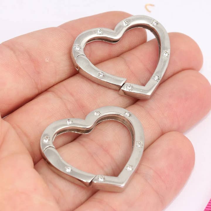 Rhodiumbelagt hjerte skrue-lås, SLM 117 for engroshandel hos QueenJewelryM